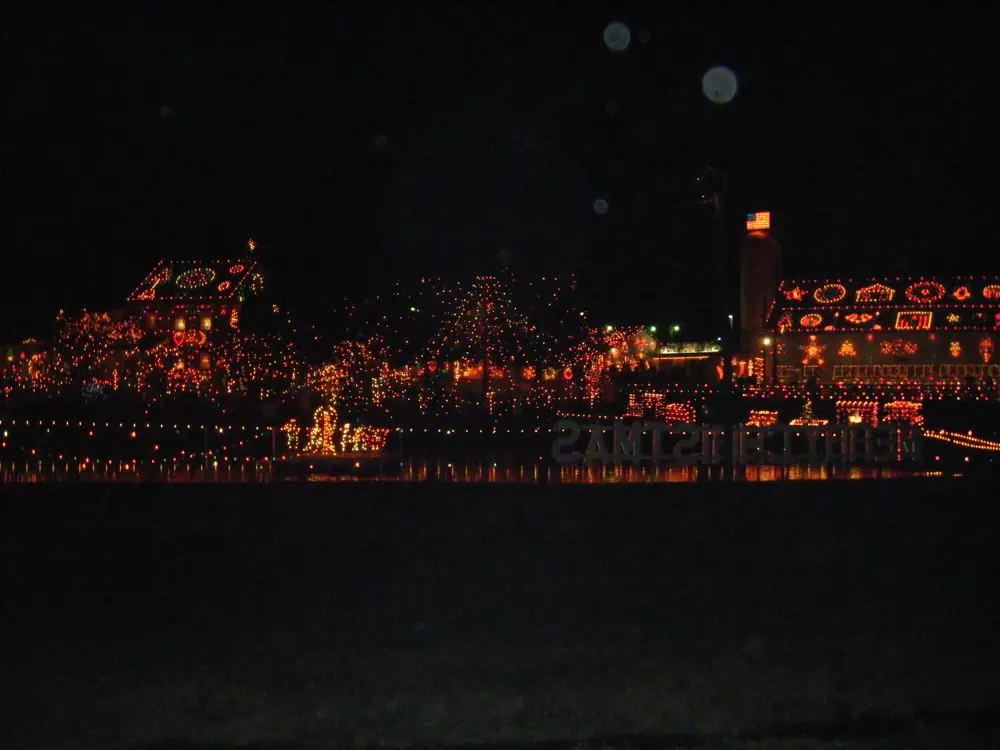 Night view of lighted buildings at Koziar's Christmas Village in Berks County, Pennsylvania